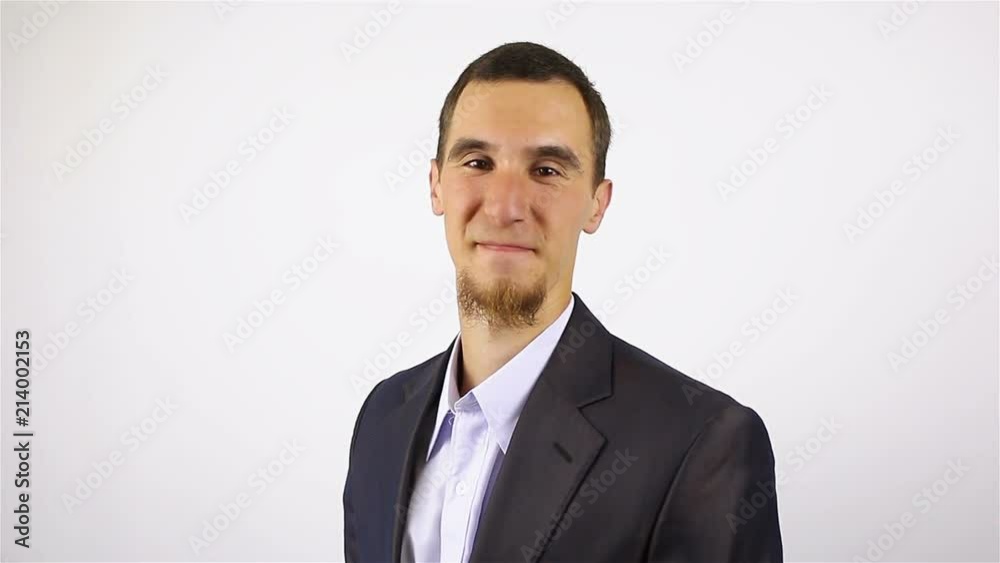 portrait of a young bearded man. Smiling looking at the camera. portrait of a young bearded man. Smiling looking at the camera.