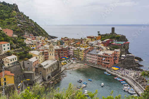 Vernazza city. Rocky seashore. Cinca Terre. Italy photo