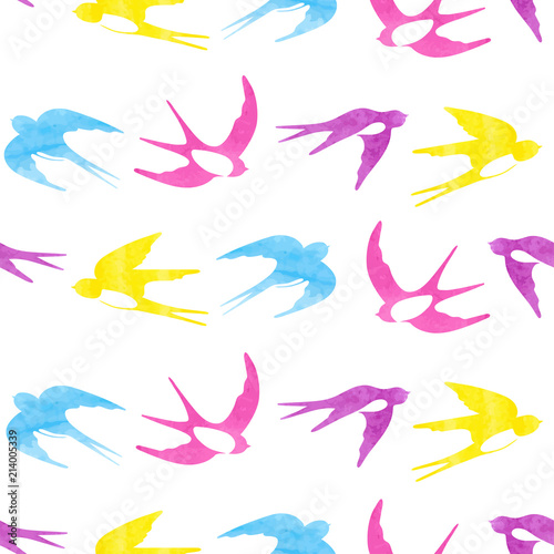 Seamless vector pattern with colorful watercolor swallows silhouettes.