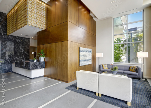 Spacious lobby area in a modern luxurious condominium. photo