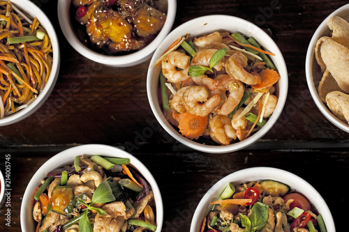 Bowls of fresh asian dishes 