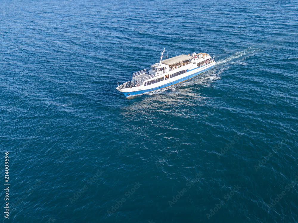 refugees imigrants in the ferry boat ship aerial view in the sea concept