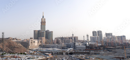 MECCA, SAUDI ARABIA - MAY 07 2018: Amazing panoramic view from a rock on the Abraj Clock Tower and skyscrapers complex, Masjid Al Haram or Grand Mosque is also visible on right side. Best for print photo