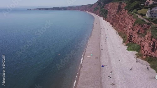 Wallpaper Mural Aerial, flying over the beach alongside red cliffs in Budleigh Salterton, Jurassic Coast, STATIC CROP Torontodigital.ca