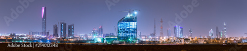 RIYADH, SAUDI ARABIA - OCTOBER 15, 2015: Outside distance skyline view on Riyadh Kingdom tower, Al Faisaliah and other business skyscrapers, full wide panorama photo