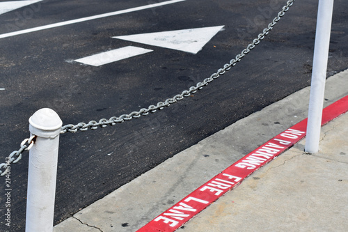 No Parking Fire Lane Curb with Chain © idgara000