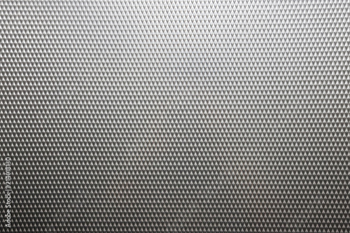 diamond shape pattern on stainless steel. diamond quadrangle on grey steel sheet background and texture. use for interior elevator wall.