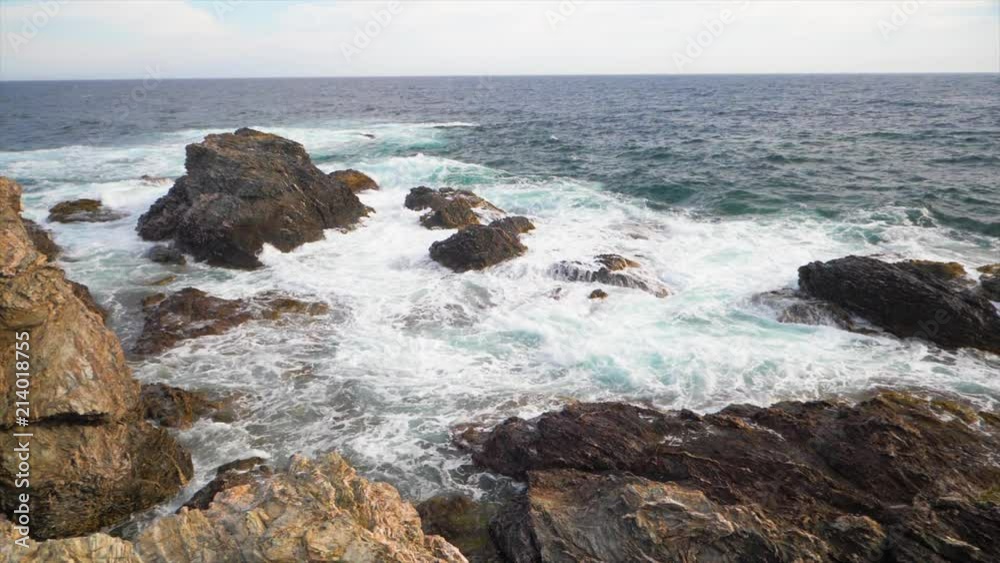 Slow motion of sea and waves crashing over french mediterrannean riviera beautiful landscape Slow motion of sea and waves crashing over french mediterrannean riviera beautiful landscape