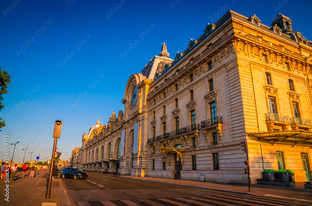 Sunset view of D'Orsay Museum on left bank of Seine, Paris, France.