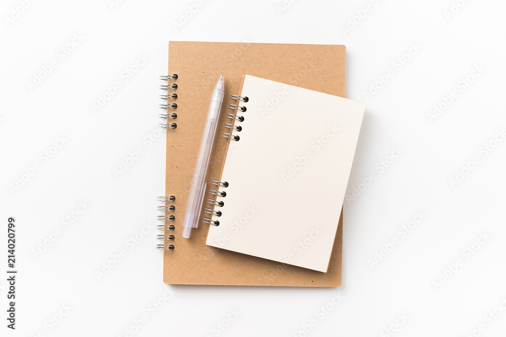 Design concept - Top view of two kraft spiral notebook, blank page, mechanical pencil isolated on white background for mockup Design concept - Top view of two kraft spiral notebook, blank page, mechanical pencil isolated on white background for mockup