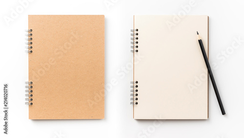 Design concept - Top view of kraft spiral notebook, blank page and wood pen isolated on white background for mockup