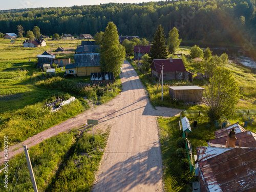 Bird's eye view of Soginicy village and Vazhinka river, Podporozhysky district. Green forests of Leningrad region and Republic of Karelia, Russia.. photo