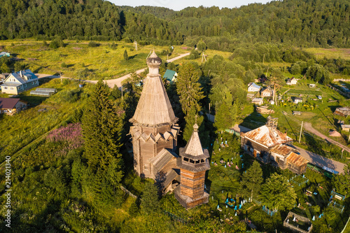 Bird's eye view of the Church of St. Nicholas (built 1696) in Soginicy village, Podporozhysky district. Green forests of Leningrad region and Republic of Karelia, Russia. photo