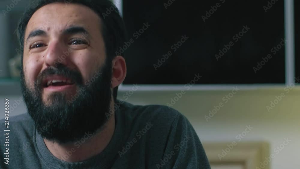 funny man speaking with his girlfriend. Smiles,laughter,fun