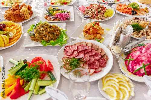 Set of cold snacks, canape, beverages, closeup