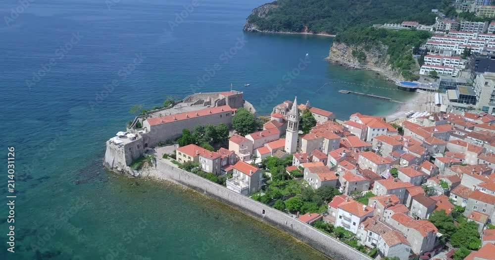Flying from a beautiful angle next to old town Budva in Montenegro Flying from a beautiful angle next to old town Budva in Montenegro