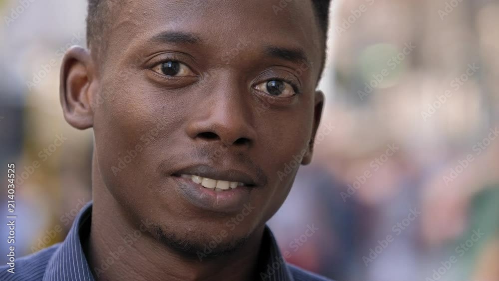 happy attractive young american african man smiling at camera happy attractive young american african man smiling at camera