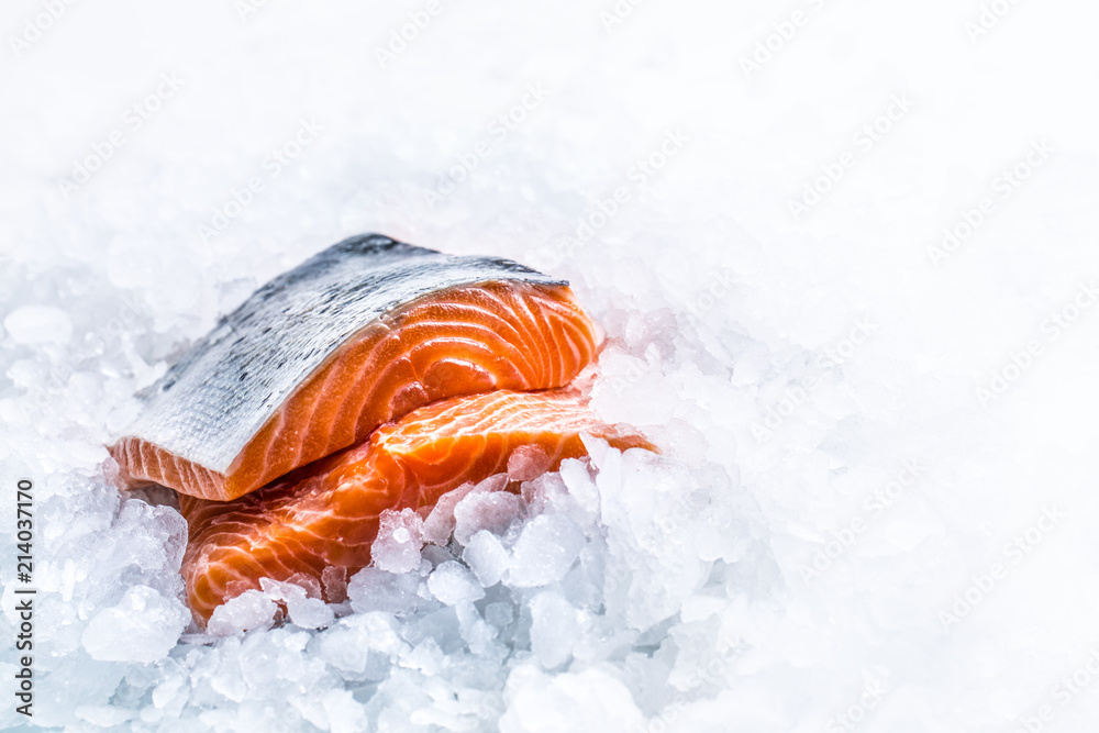 Close-up Fresh raw salmon fillets on Ice