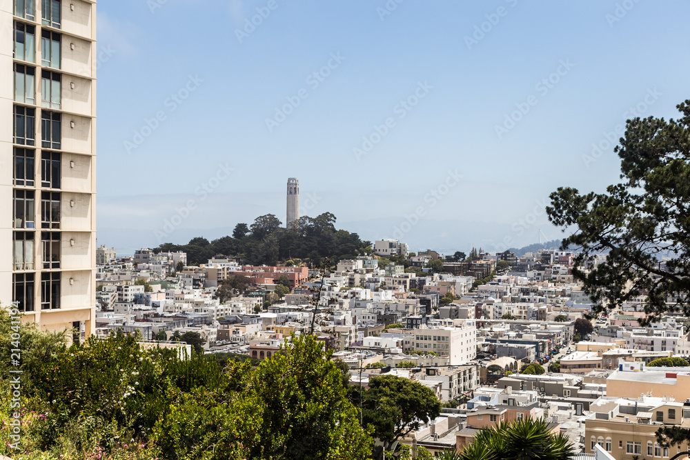 A view of the famous Coit Tower from Russian hill, with many luxury condo towers are located, in San Francisco, California, USA