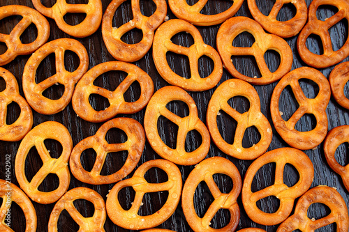 salted crispy fresh pretzels lie on the table