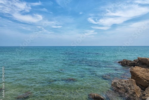 Coast of mediterranean sea with the sky and waves.