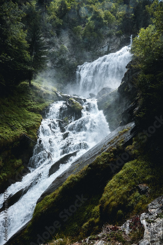Fototapeta Naklejka Na Ścianę i Meble -  Waterfall in forest at Lenteney Valle D'Aosta