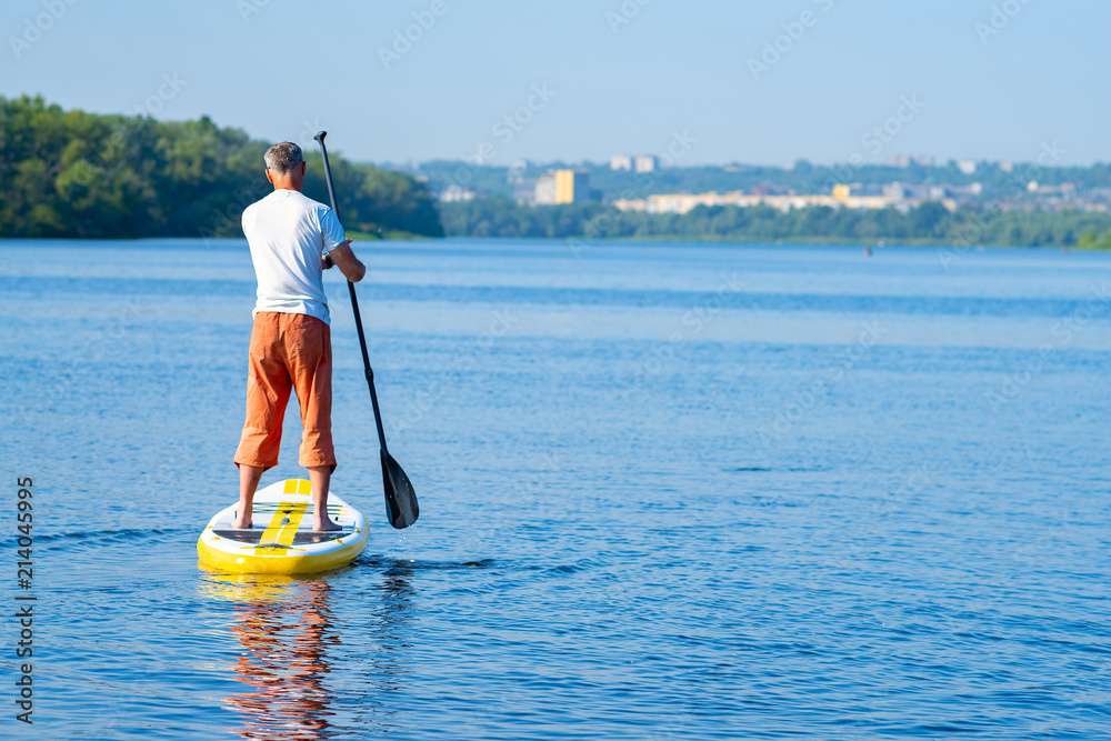 Man paddling on a SUP board