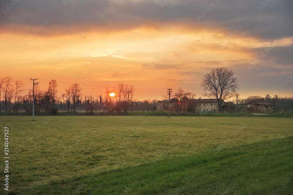 Fototapeta premium House in the country at sunset
