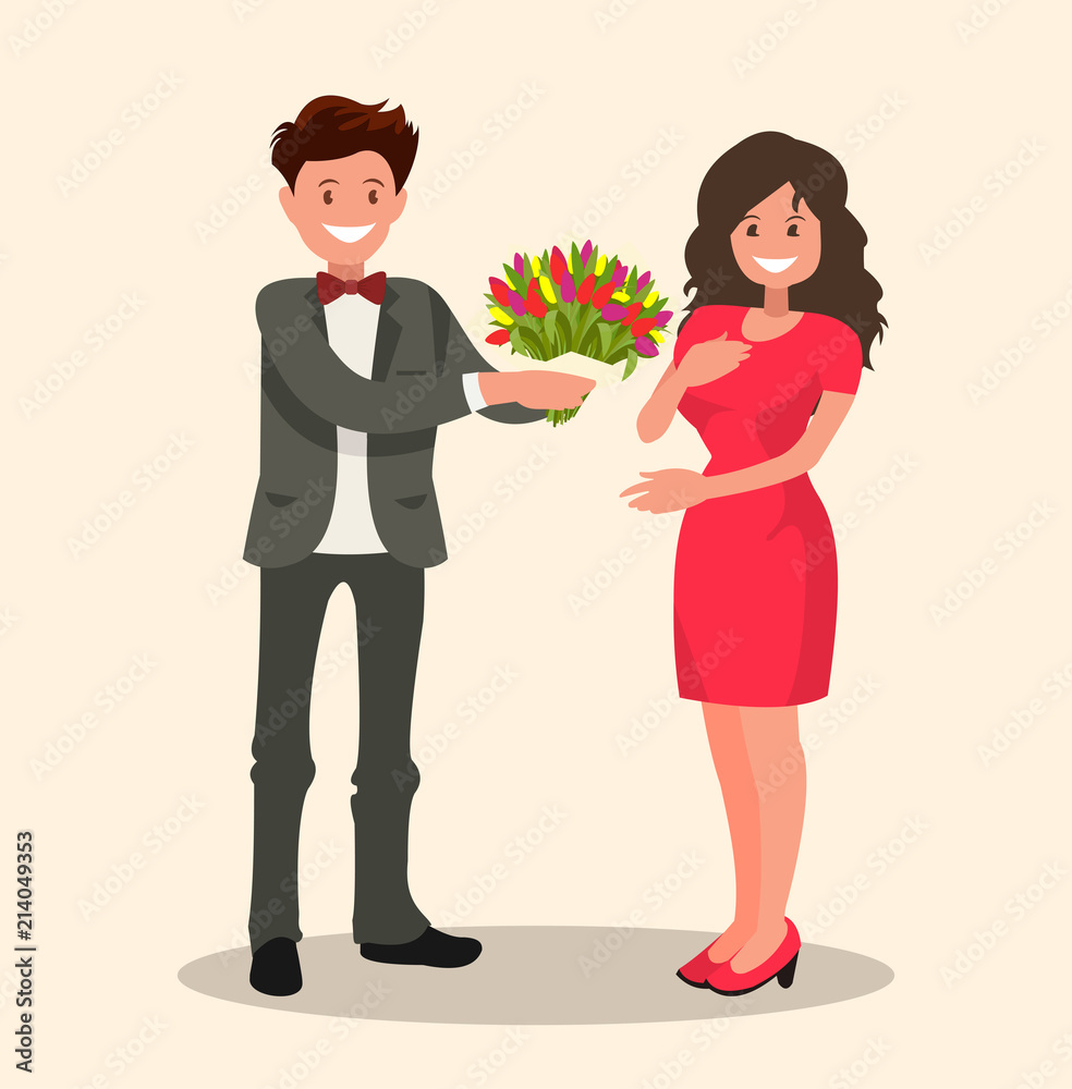 Man dressed in a suit gives a woman a bouquet of flowers and a gift. Man dressed in a suit gives a woman a bouquet of flowers and a gift.