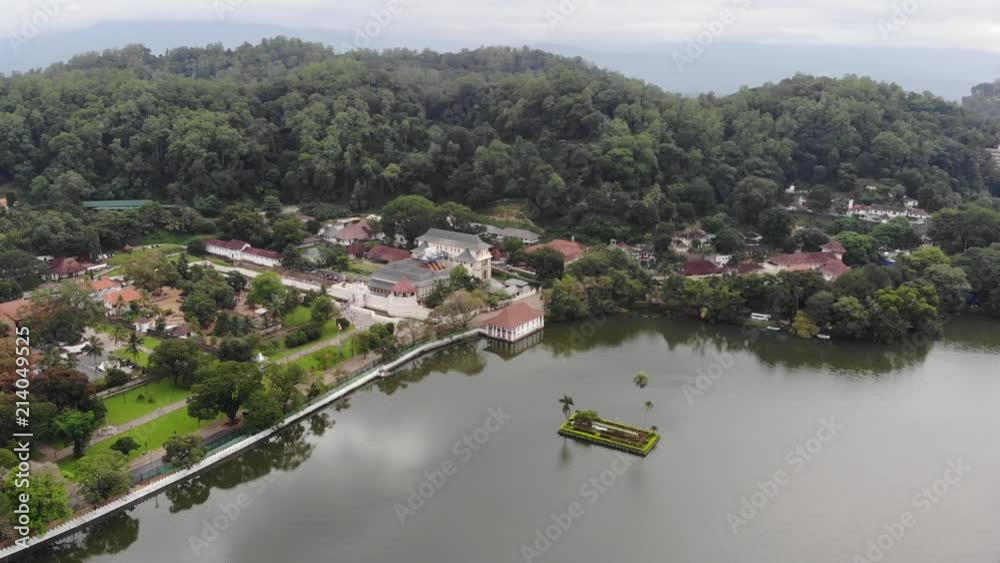 Aerial panning view of the Temple Of The Tooth and the city of Kandy by the lake. Aerial panning view of the Temple Of The Tooth and the city of Kandy by the lake.