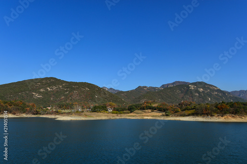 A big lake surrounded by mountains in Korea. © sulccojang