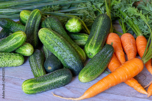 fresh clean vegetables, carrots and cucumbers