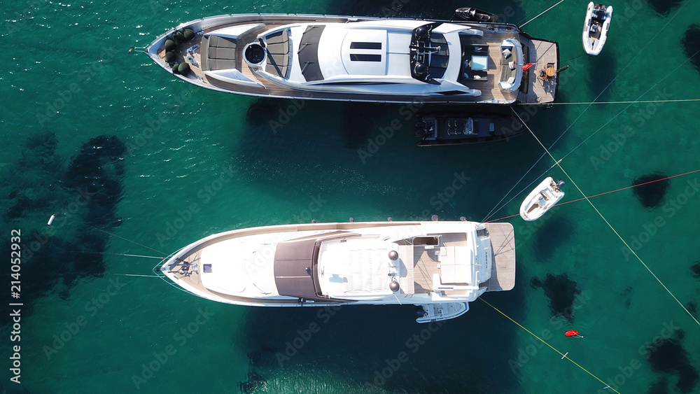 Aerial photo of yachts docked in popular tropical caribbean island destination Aerial photo of yachts docked in popular tropical caribbean island destination