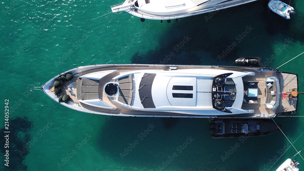 Aerial photo of yachts docked in popular tropical caribbean island destination - obrazy, fototapety, plakaty 