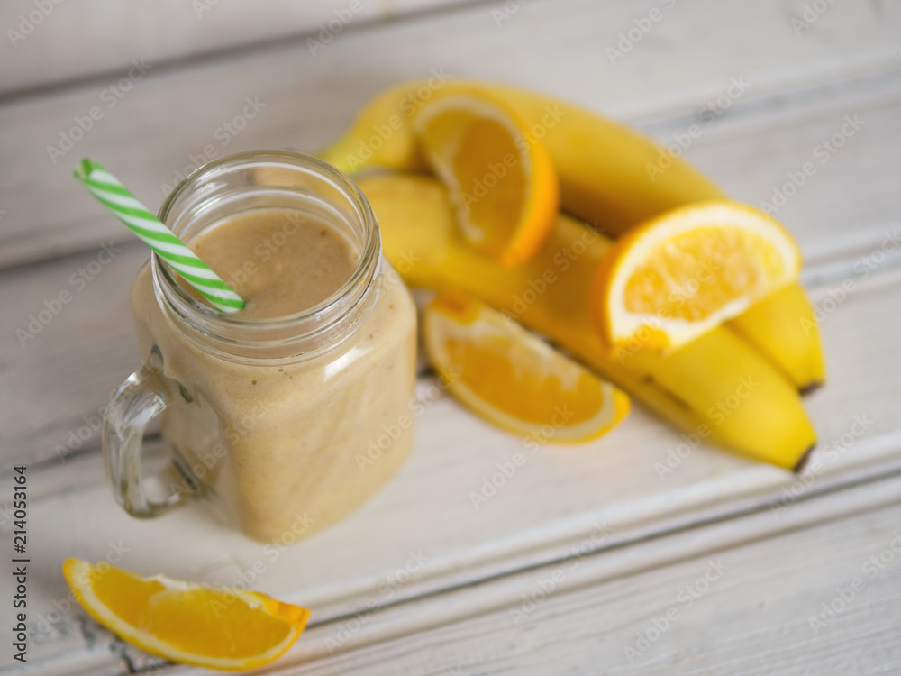 A banana orange smoothie. Healthy milkshake A banana orange smoothie. Healthy milkshake