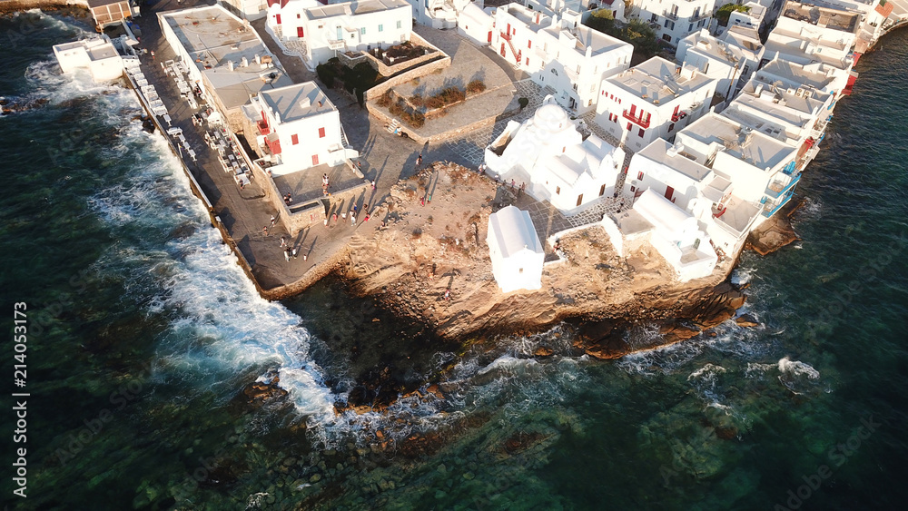 Aerial photo from iconic Paraportiani church in little Venice at sunset, old port of Mykonos island, Cyclades, Greece Aerial photo from iconic Paraportiani church in little Venice at sunset, old port of Mykonos island, Cyclades, Greece