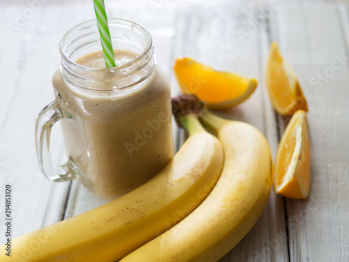 A banana orange smoothie. Healthy milkshake