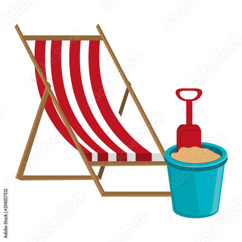 wooden beach chair and sand bucket