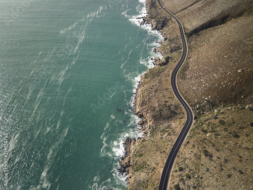 Winding coastal road in False Bay, South Africa. A scenic drive along the mountain to Gordons Bay
