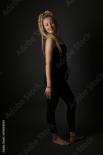 Blonde young woman dancing dancehall