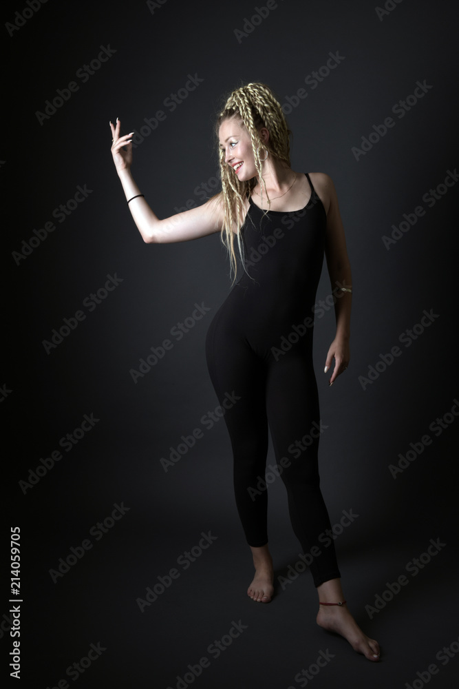 Blonde young woman dancing dancehall