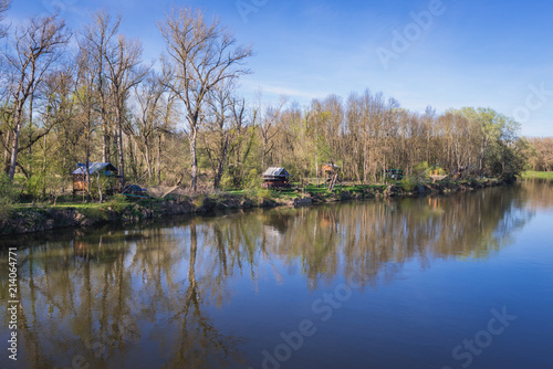 Traditional cottages for fishing in Austria on the bank of Morava river, natural border between Austria and Slovakia