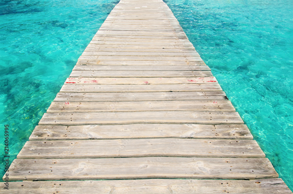 Empty wooden pier in beautiful turquoise sea. Empty wooden pier in beautiful turquoise sea.