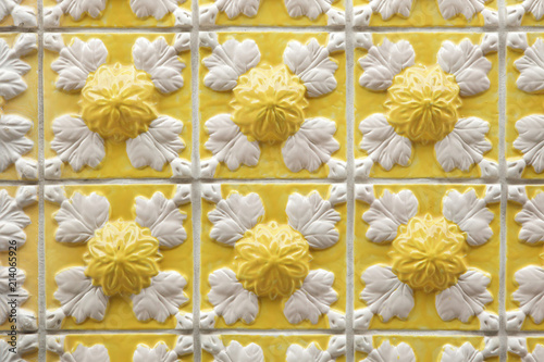 Traditional Portuguese azulejo tiles on the building in Porto, Portugal.