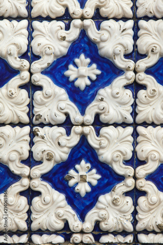 Traditional Portuguese azulejo tiles on the building in Porto, Portugal.