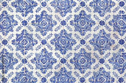 Traditional Portuguese azulejo tiles on the building in Porto, Portugal.