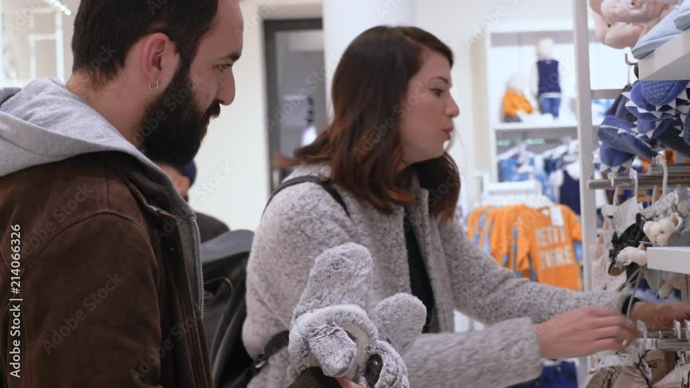 custom made wallpaper toronto digitalexpecting couple in a baby store looking for clothes- slow motion
