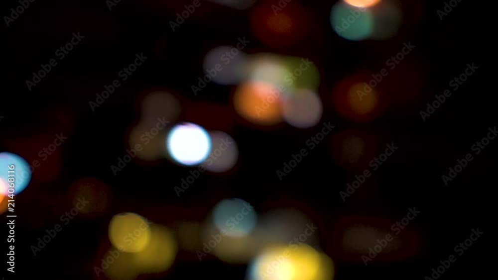 Urban city lights defocused Bokeh moving and swaying at night dark as if drunk walking Urban city lights defocused Bokeh moving and swaying at night dark as if drunk walking