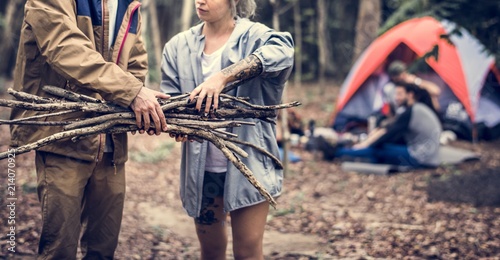 Friends camping in the forest together