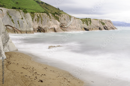 cliffs with flysch stratotypes on the beach of itzurun in Zumaia in the Basque Country, in the north of Spain.
